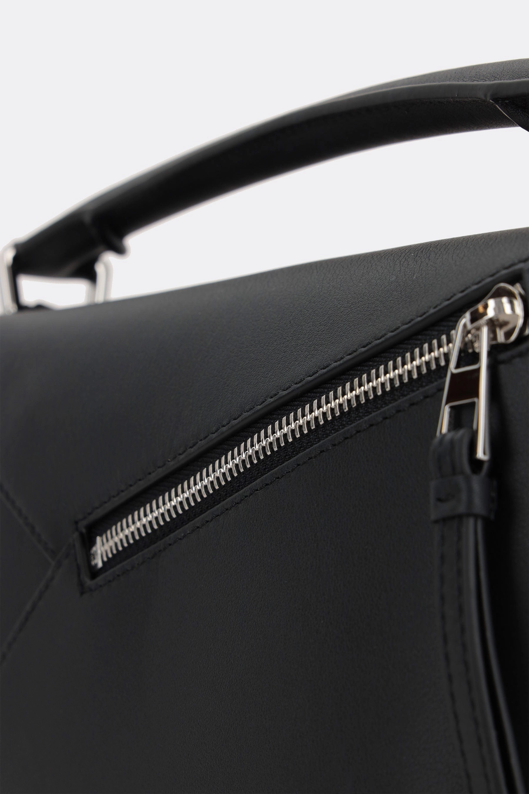 Puzzle small handbag in Classic leather